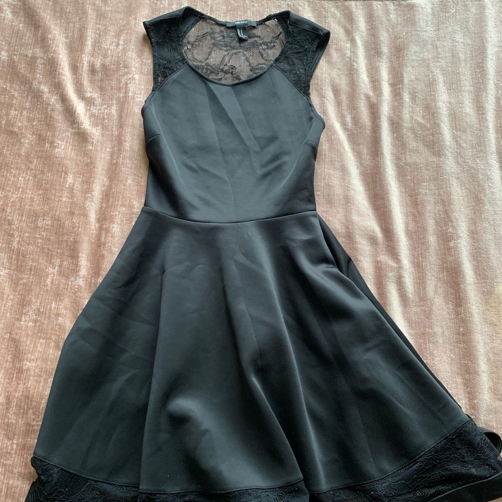 Black fit and flare dress with lace detail